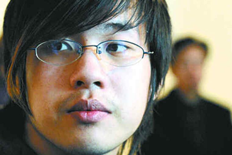 Wei Chen at a December news conference. He pushed the school district to address long-standing race problems. (April Saul / Staff)