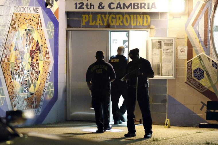 Philadelphia Police process the scene at the 12th and Cambria Rec Center in Philadelphia where a teen was shot and killed and another wounded around 8 p.m. on Aug. 1, 2018.