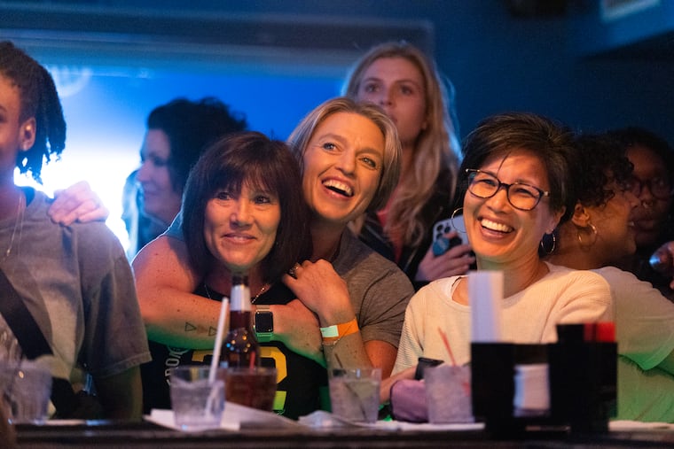 Fans at a Watch Party event take in a game between the New York Liberty and the Indiana Fever in May 2024.