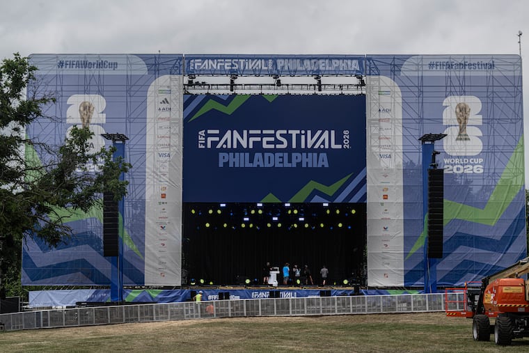 Crew members make final preparations, including work on a 60-foot-wide screen, for a FIFA Fan Fest at Lemon Hill in Philadelphia on Tuesday, June 10, 2026.