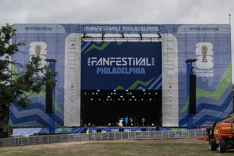 Crew members make final preparations, including work on a 60-foot-wide screen, for a FIFA Fan Fest at Lemon Hill in Philadelphia on Tuesday, June 10, 2026.