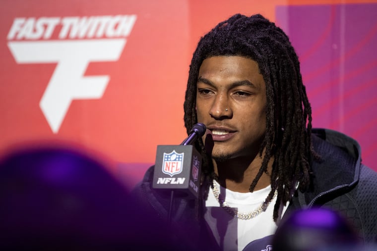 Kansas City Chiefs running back Isiah Pacheco talks with members of the media during Super Bowl LVII Opening Night.