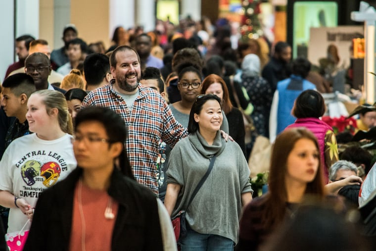Shoppers in King of Prussia on Black Friday. Consumer confidence depends on wages.