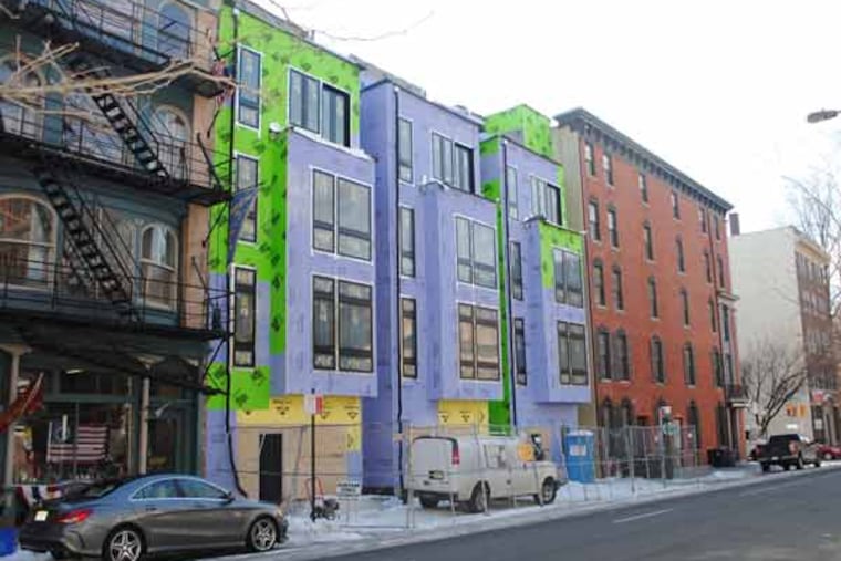 A view of the three Ross Luxury Townhomes located on the 200 block of Arch Street just three months before the project is expected to be completed.