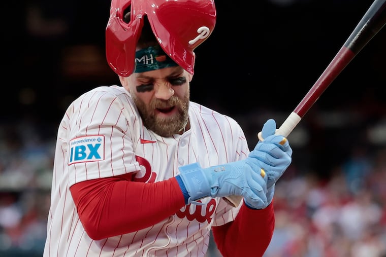 Bryce Harper is hit by a pitch from Atlanta's Spencer Strider in the first inning Tuesday at Citizens Bank Park.