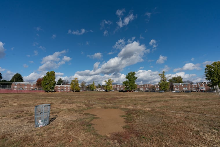 A view of home plate on the field that functions as the soccer pitch and girls' softball practice field at Northeast High School.