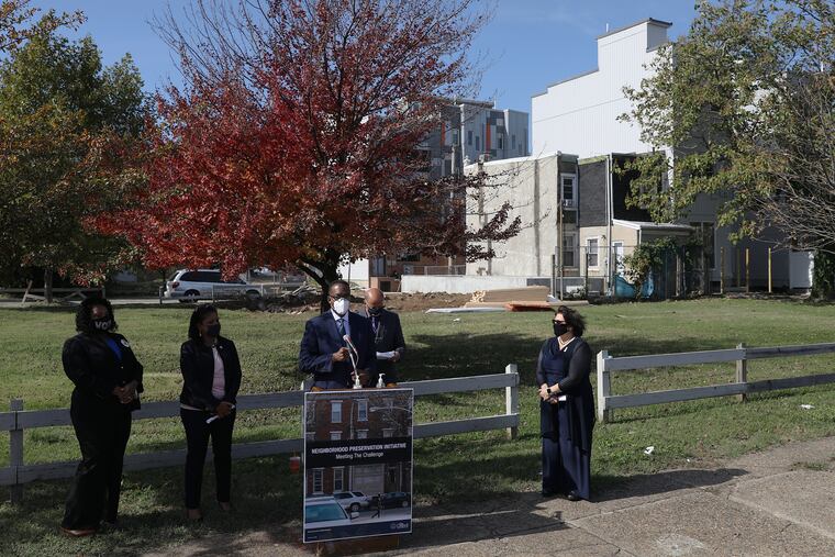 City Council President Darrell L. Clarke (center) speaks during a news conference at the site of a planned affordable housing development at Third and Berks Streets in North Philadelphia in 2020.