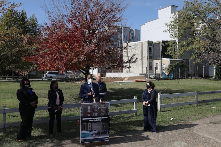 City Council President Darrell L. Clarke (center) speaks during a news conference at the site of a planned affordable housing development at Third and Berks Streets in North Philadelphia in October.