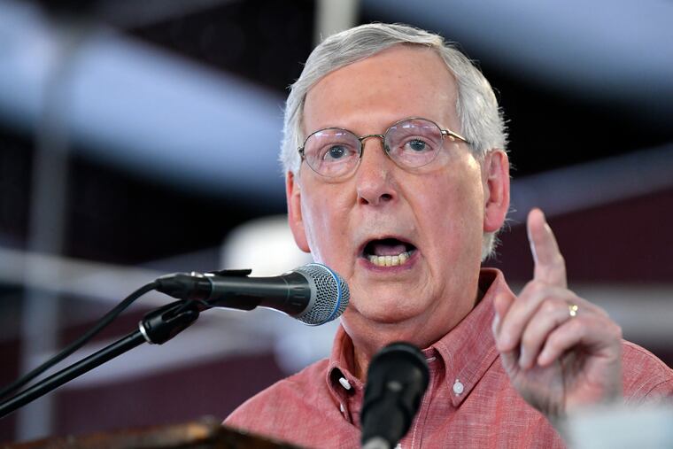 Senate Majority Leader Mitch McConnell, R-Ky., addresses the audience gathered at the Fancy Farm Picnic in Fancy Farm, Ky., Saturday, Aug. 3, 2019. (AP Photo/Timothy D. Easley)