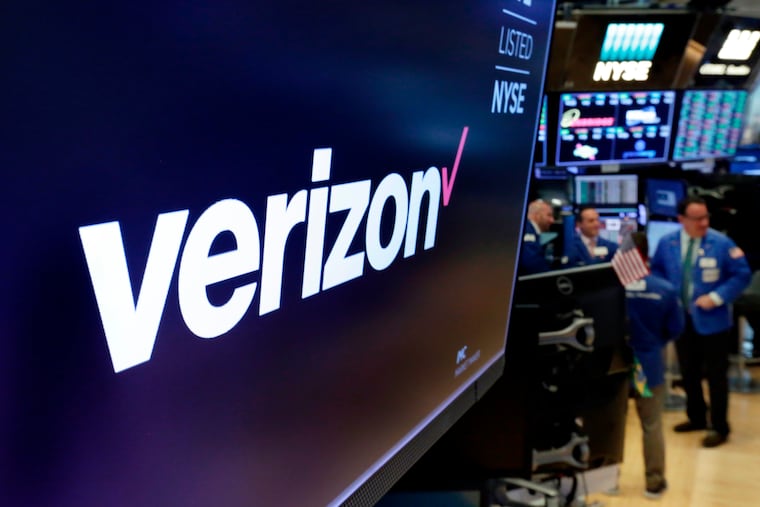 The logo for Verizon above a trading post on the floor of the New York Stock Exchange in 2018.