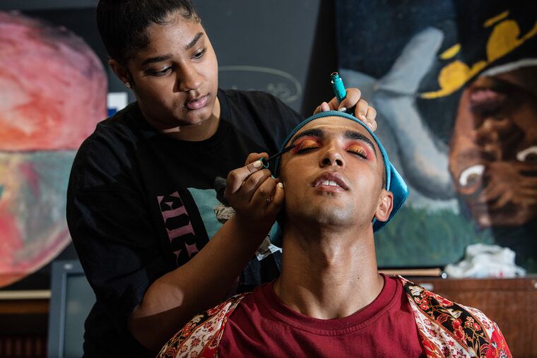 Student, Carmen Jenkins applies make up to Senior, Nate Randall, in preparation for the Penn Wood HS Gay Straight Alliance drag show at Penn Wood High School in Lawnsdowne, Pa.