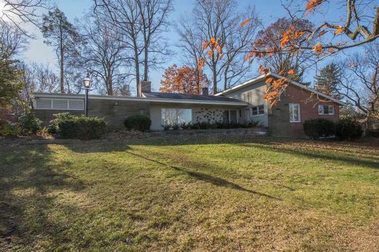The four-bedroom home includes three full baths and a powder room over 2,361 square feet. The current owners have done some remodeling over 20 years, including adding a recording studio in the basement.