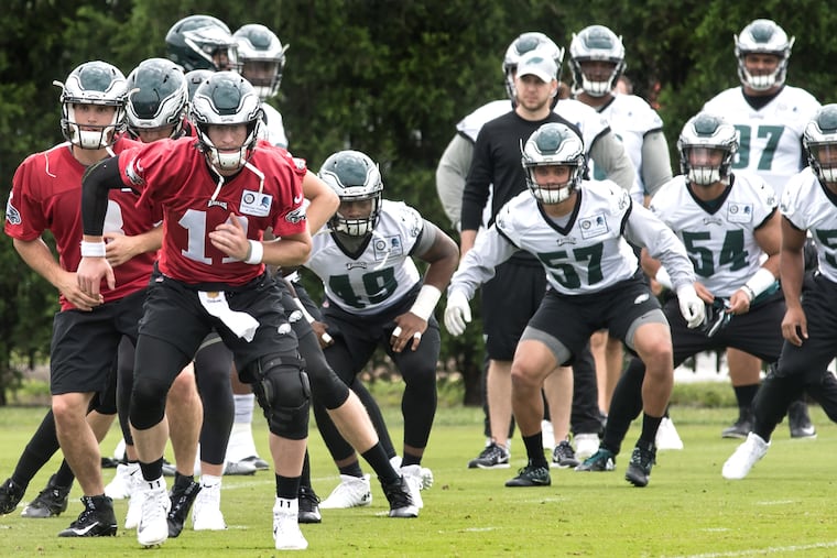 Carson Wentz runs a drill during Wednesday's OTAs.