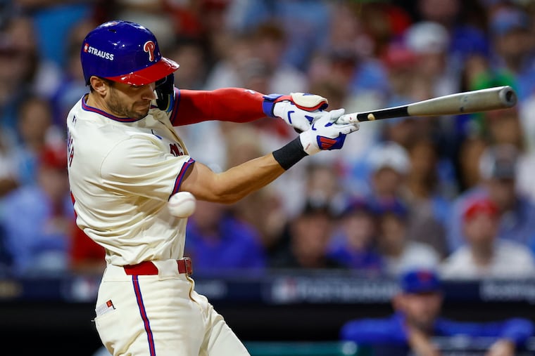 The Phillies' Trea Turner strikes out in the eighth inning on Saturday.