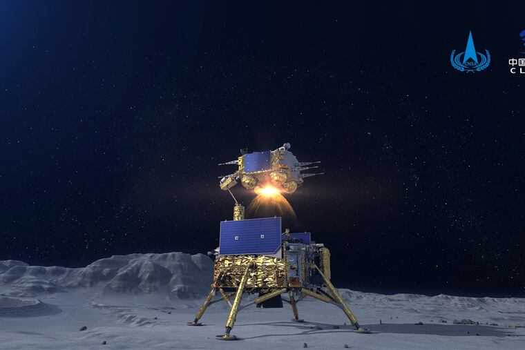 In this China National Space Administration (CNSA) photo released by Xinhua News Agency, a simulated image of the ascender of Chang'e-5 spacecraft blasting off from the lunar surface at the Beijing Aerospace Control Center (BACC) in Beijing on Dec. 3.
