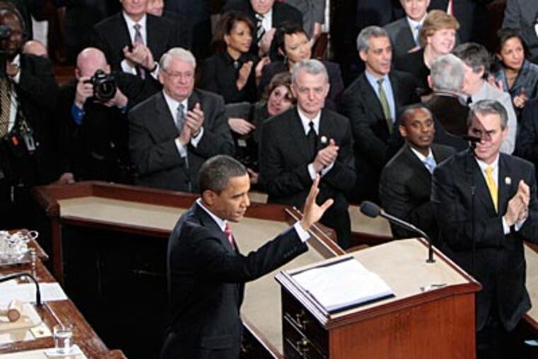 President Barack Obama waves before delivering his State of the Union address on Capitol Hill in Washington, Wednesday, Jan. 27, 2010. (AP Photo/Pablo Martinez Monsivais)