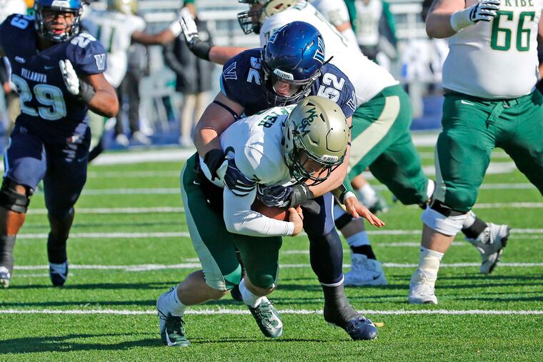 Villanova linebacker Drew Wiley (52) recording a sack against William and Mary last season.