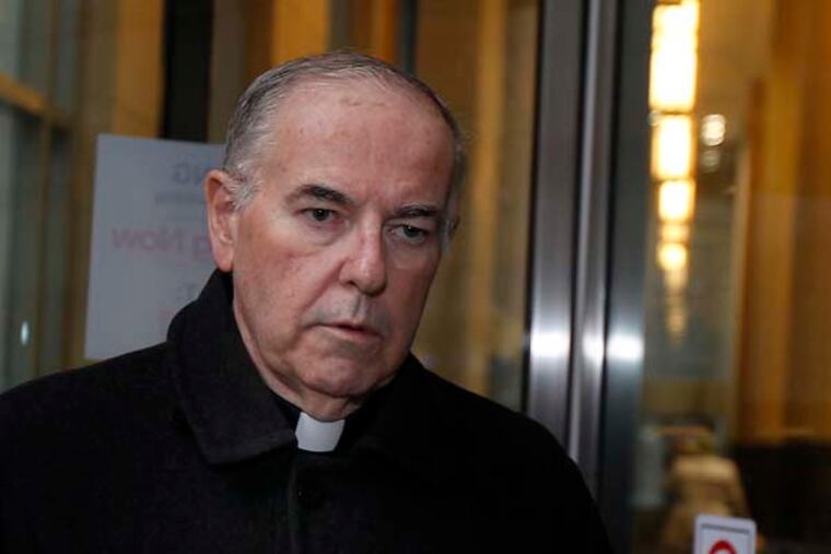 Rev. Charles Engelhardt leaves the Criminal Justice Center at the end of the day. Rev. Engelhardt and Bernard Shero are accused of molesting a fifth grader at St. Jerome's parish and school in 1998 and 2000, when the boy was a fifth-grader at St. Jerome's parish. The trial opened on Monday in Common Pleas Court at the CJC in Philadelphia on January 14, 2013. ( DAVID MAIALETTI / Staff Photographer )