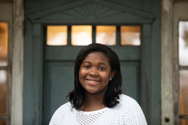 Trinity Smith, 17, posed for a portrait outside of her home in Elkins Park. Smith is not old enough to vote, but has volunteered to work at a polling place near her home.