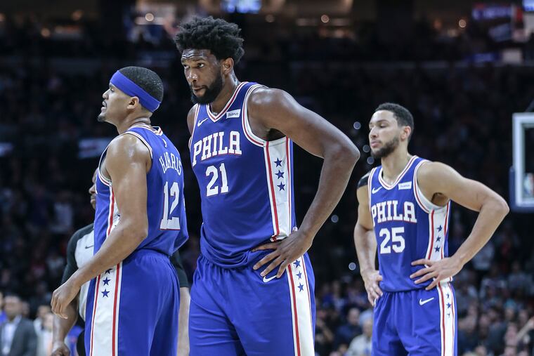 Sixers' Joel Embiid cools down after fouling the Knicks' Marcus Morris Sr. during the second quarter.
