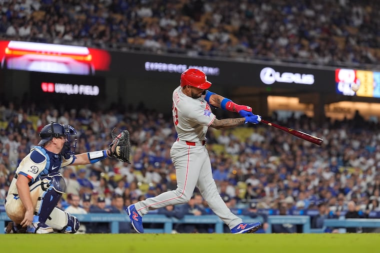 Edmundo Sosa hit a two-run homer in eighth inning.