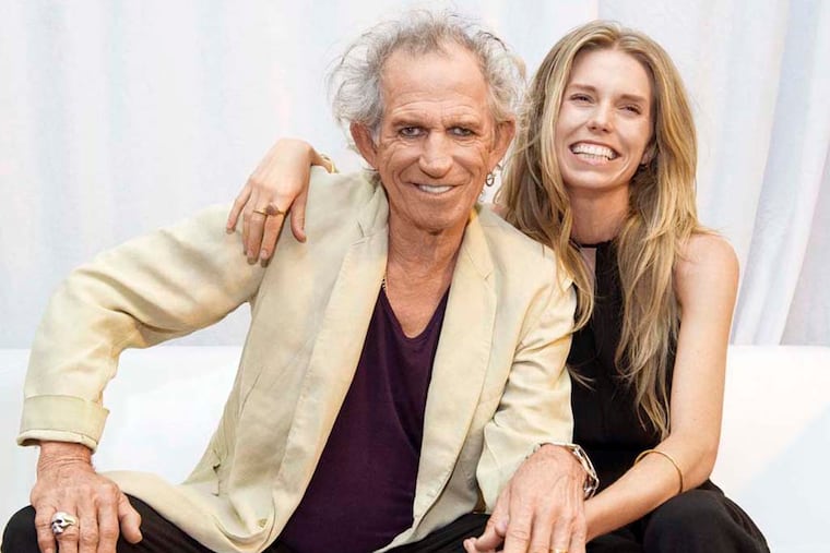 This undated image released by Mindless Records shows Keith Richards, of The Rolling Stones, left, with his daughter Theodora Richards. "Gus & Me: The Story of My Granddad and My First Guitar," by Keith Richards and art by Theodora Richards. The book will be released on Sept. 9, 2014. (AP Photo/Mindless Records, Brian Rasic)