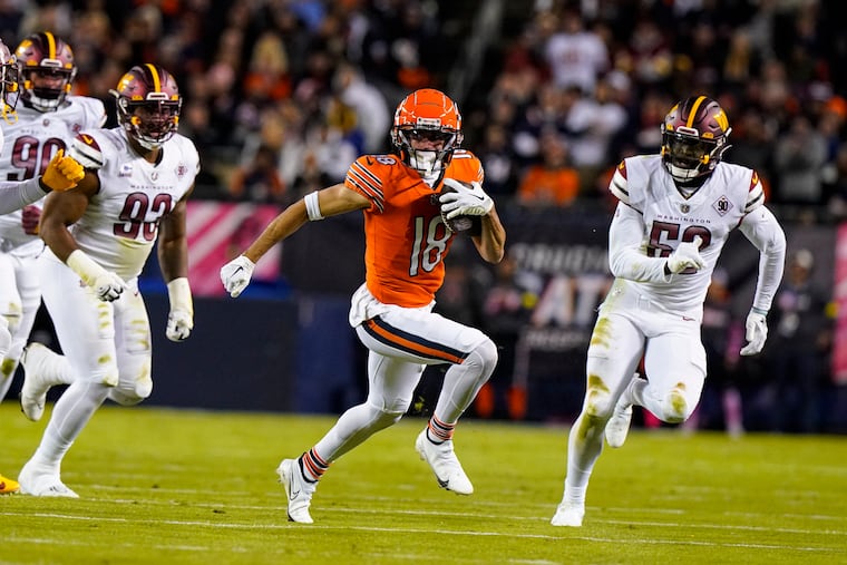 Chicago Bears wide receiver Dante Pettis heads upfield after a catch against the Washington Commanders in the first half of an NFL football game in Chicago, Thursday, Oct. 13, 2022. (AP Photo/Nam Y. Huh)