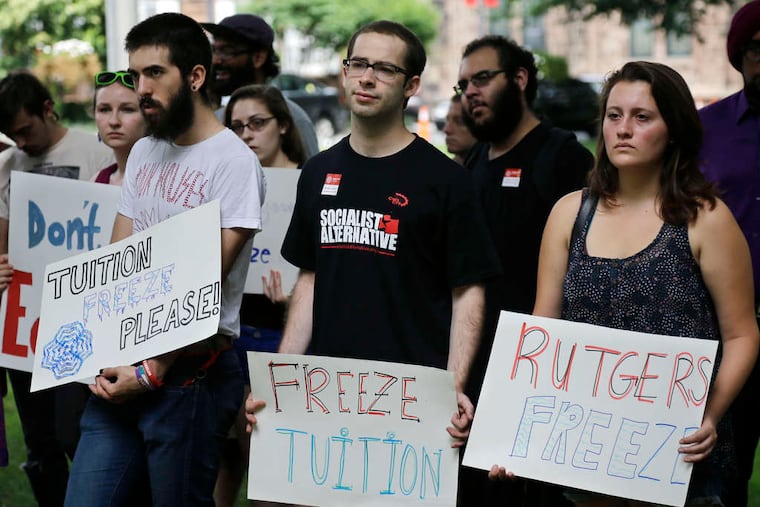 Rutgers University students outside a meeting of the board of governors, which raised tuition and fees 3.3 percent. About 10 protesters addressed the board.