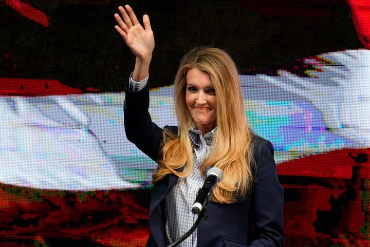 Sen. Kelly Loeffler greets supporters.