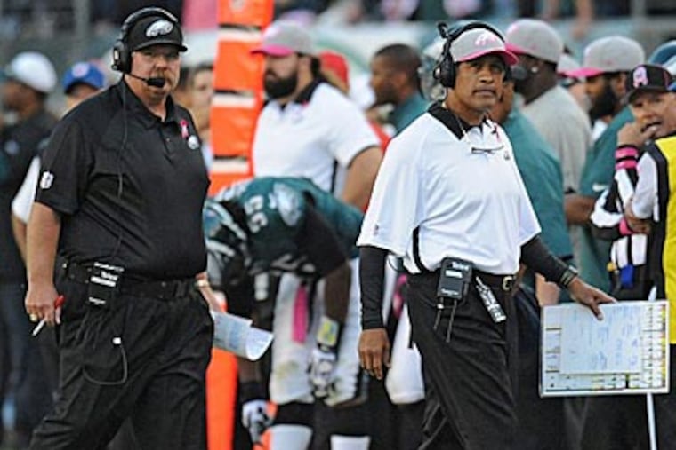 Eagles coach Andy Reid fired defensive coordinator Juan Castillo on Tuesday. (Clem Murray/Staff Photographer)