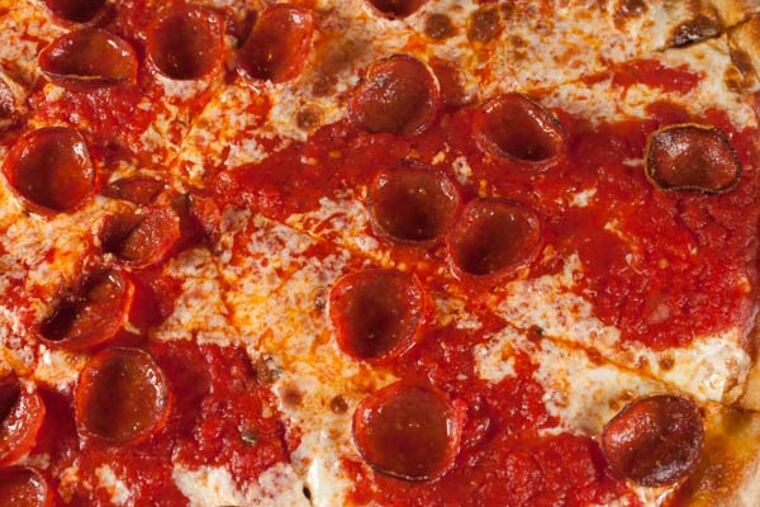 Tomato pie with pepperoni as served at Gennaro's Tomato Pie, 1429 Jackson St., Philadelphia, April 18, 2013. ( DAVID M WARREN / Staff Photographer )