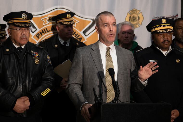 Managing Director Adam K. Thiel (center) announced Tuesday that the area around the Northeast Philly plane crash site may soon reopen to residents and businesses.