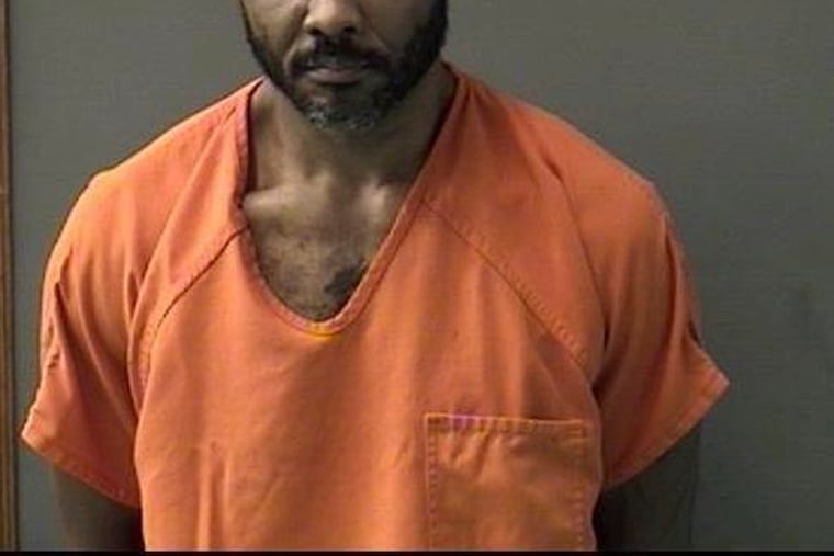 FILE - This undated booking photo released by Bell County Sheriff's Office shows Cedric Marks. The MMA fighter accused of killing two people before escaping from a private prison van says he had "nothing to do with" the bodies found buried in Oklahoma last month. (Bell County Sheriff's Office via AP, File)