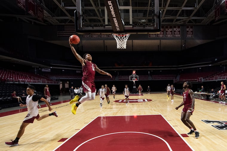 Temple University Men's basketball, Nate Pierre-Louis, 15, goes up for a dunk during practice at the Liacouras Center in Philadelphia, Pa. Tuesday, October 29, 2019.