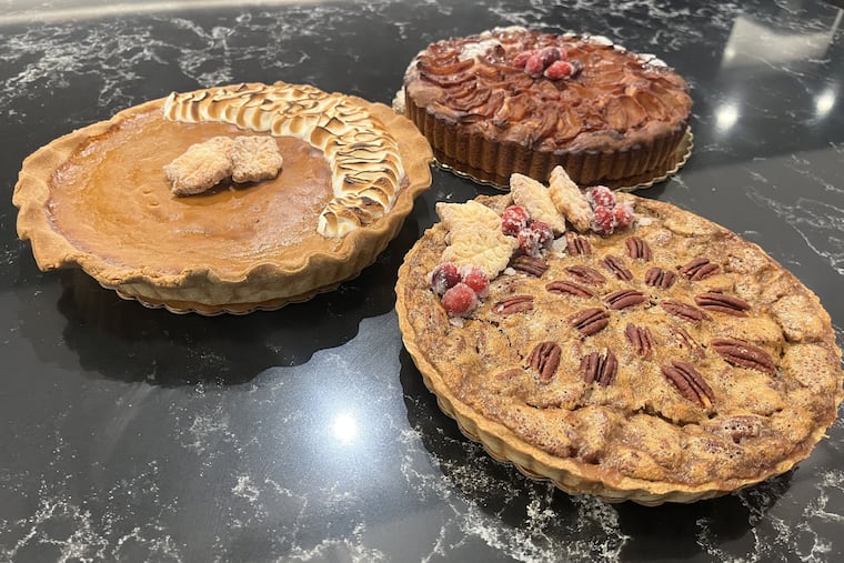 Clockwise from right to left: an apple tart tatin, bourbon pecan tart, and pumpkin maple tart from gluten free bakery Flakely. Each is available while supplies last for pre-order and pick-up at 220 Krams Ave. in Manayunk.