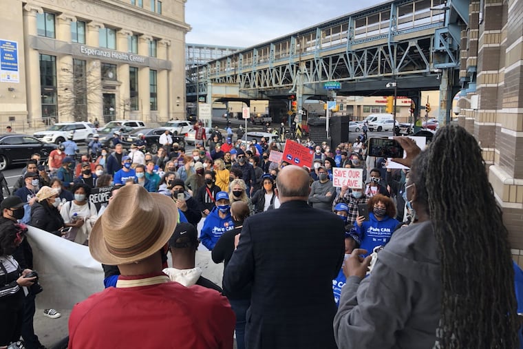City Councilman Mark Squilla (blue suit) addressing a rally of Kensington residents at the Allegheny El Station. Residents were protesting SEPTA's decision to close the Somerset Station for an extended period to make repairs and improve safety.