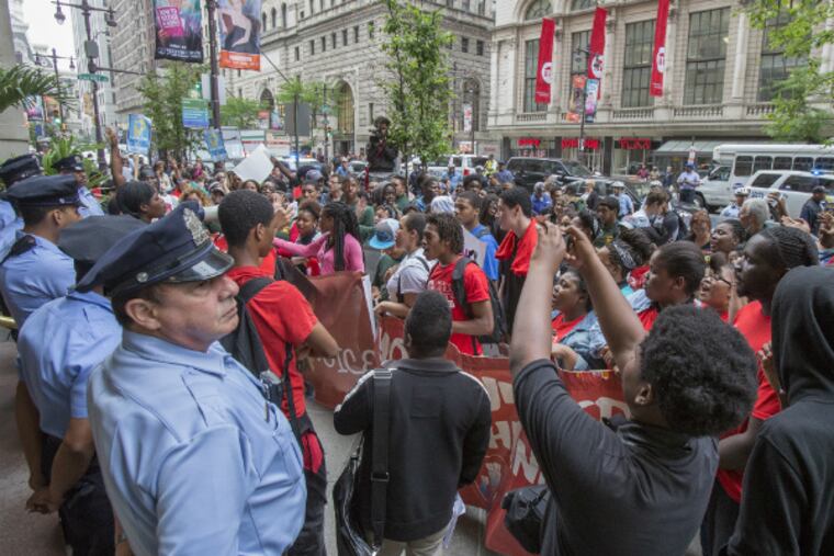 About 100 students and supporters tried to keep pressure on lawmakers Wednesday by marching to Gov. Corbett's downtown office.