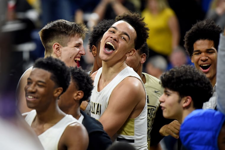 Neumann Goretti's Jordan Hall, center, is a St. Joseph's commit.