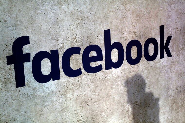 This Jan. 17, 2017, file photo shows a Facebook logo at Station F in Paris. Facebook has decided not to limit how political ads can be targeted to specific groups of people, as its main digital-ad rival Google did in November 2019 to fight misinformation. Neither will it ban political ads outright, as Twitter has done. And it still won't fact check them, as it's faced pressure to do.