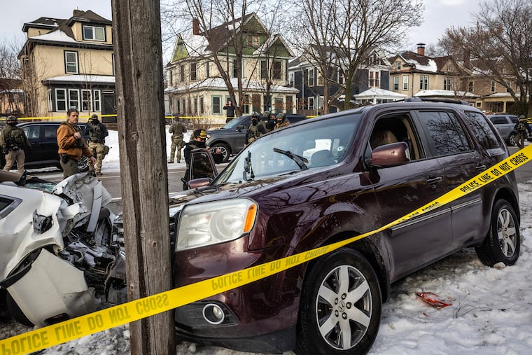 Crime scene tape surrounds the vehicle of Renee Good after she was fatally shot by an ICE agent in Minneapolis on Jan. 7, 2026. In a sharp departure from past practice, FBI gents will no longer run investigations that could generate evidence against immigration agents, according to people familiar with the matter.
