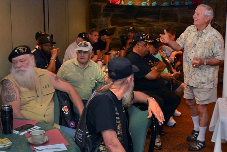 Retired VA social worker Tony Capone (right) leads a veterans PTSD peer support group at the Garden State Diner in Wrightstown, NJ, Monday mornings. On the left, Leo “Smooth” Ethier, one of the group founders, sits at a table next to another founder, Lynn “Mo Aces” Moyer (back turned).
