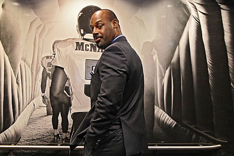 Former Eagles quarterback Donovan McNabb, in a Lincoln Financial Field elevator that bears his likeness. (Michael Bryant/Staff Photographer)