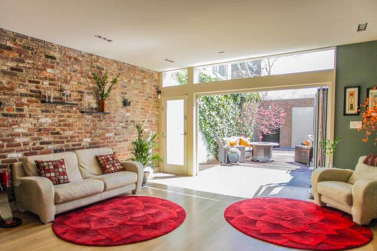 This Society Hill townhome, designed by renowned architect Cecil Baker, is on the market for $2.18 million.