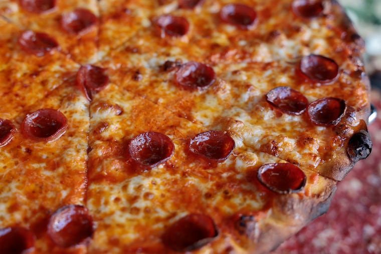 The Classic Tomato Pie with crushed tomatoes, mozzarella, garlic, pepperoni and Mike’s Hot Honey at CJ & D's Trenton Tomato Pies, 1326 E Passyunk Ave. in Philadelphia on Wednesday, September 3, 2025.