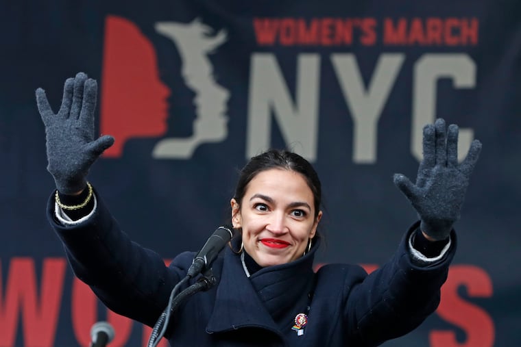 U.S. Rep. Alexandria Ocasio-Cortez (D., N.Y.) is one of the architects of the sweeping Green New Deal, which would slash carbon emissions to fight climate change - and cost a bundle. Senior Democrats are urging the party's left to be more practical and incremental, lest it scare away voters.