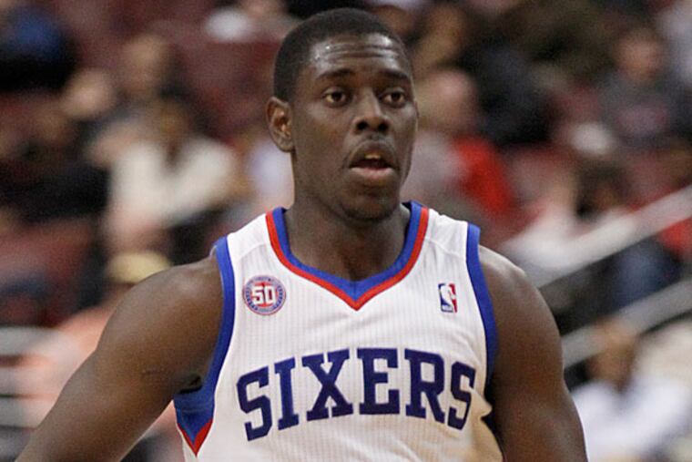 Jrue Holiday dribbles the basketball against the Portland Trail Blazers on Monday, March 18, 2013. (Yong Kim/Staff Photographer)