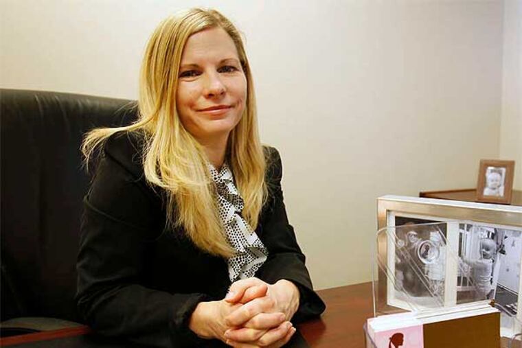 TJ Henderson runs Surrogate Services International, a business that's legal in Pennsylvania but not in New York and other places. (Alejandro A. Alvarez / Staff Photographer)