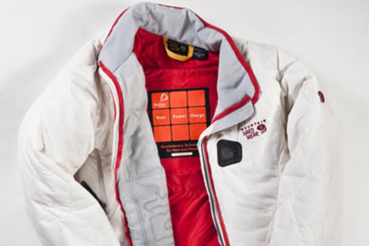You can now buy battery-heated jackets, vests, gloves and shoe insoles. Here is a white battery powered jacket, the "Arcadia Enabled" by Mountain Hard Wear. (Bill Hogan/Chicago Tribune/MCT)