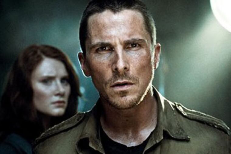 In this film publicity image released by Warner Bros., Bryce Dallas Howard, left, and Christian Bale are shown in a scene from, "Terminator Salvation." (AP Photo/Warner Bros.)