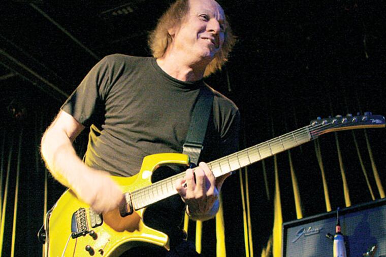 Guitarist Adrien Belew.